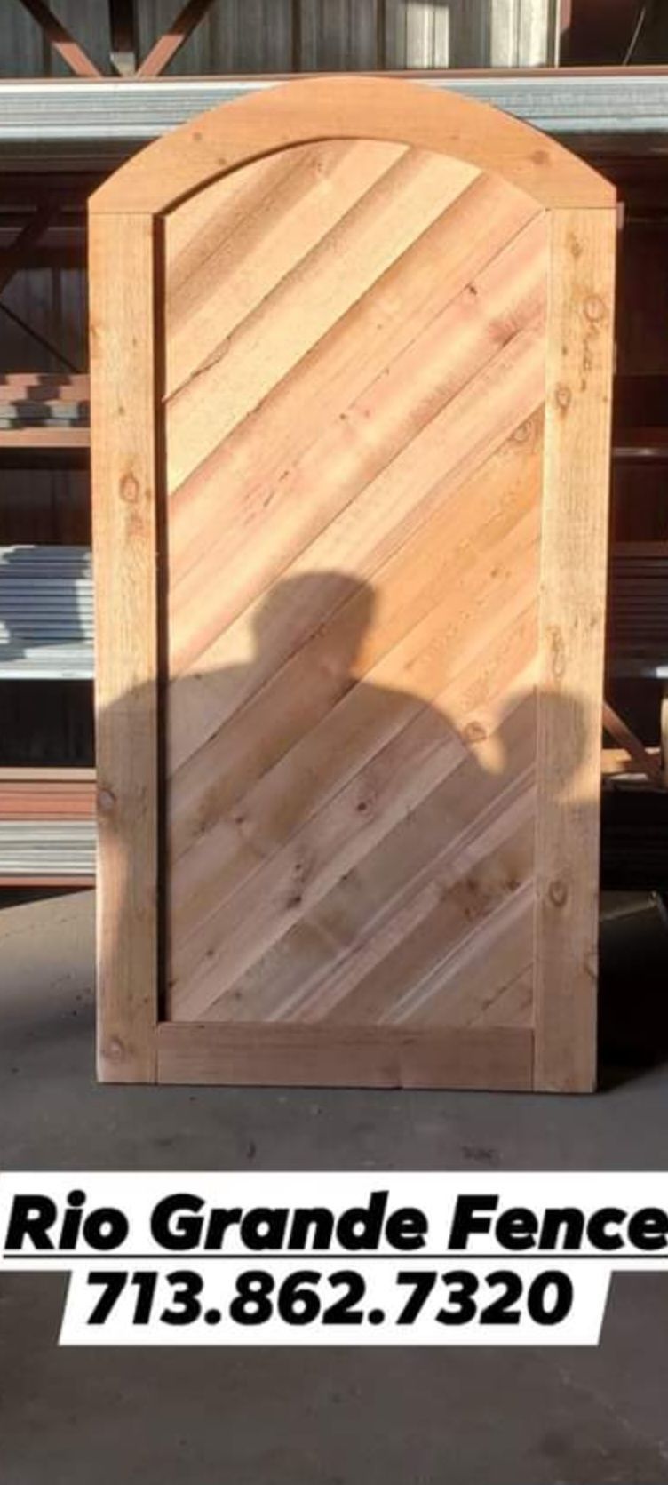 A Wooden Door with A Shadow of A Person on It - Houston, TX - Rio Grande Fence Company