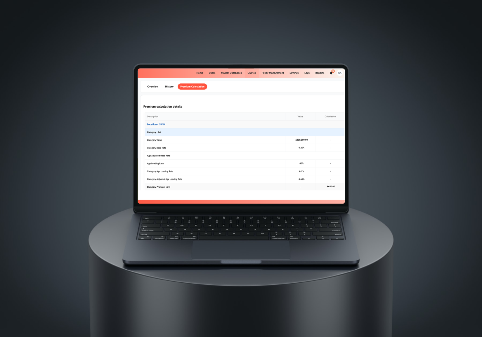 A laptop computer is sitting on top of a black cylinder.