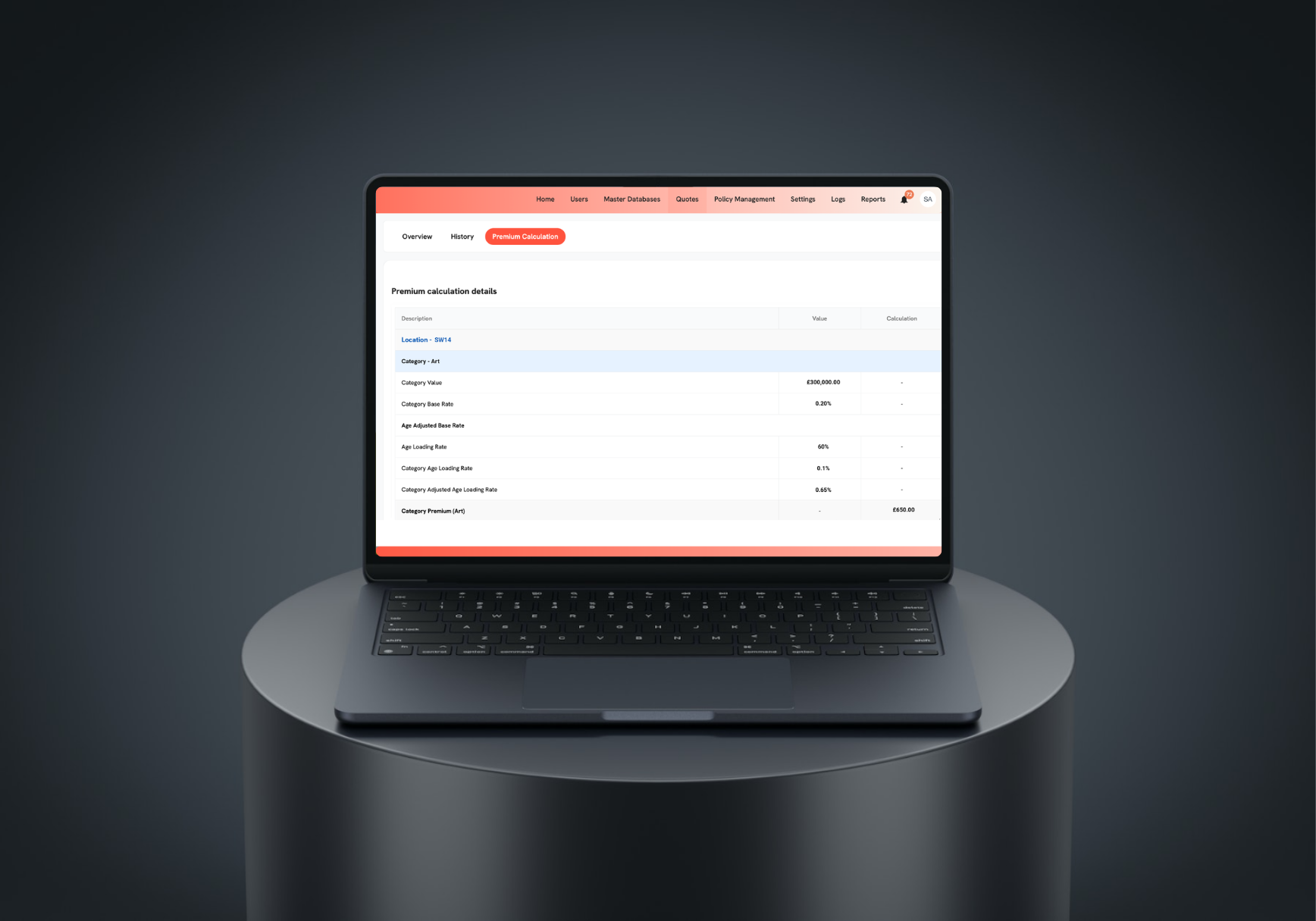 A laptop computer is sitting on top of a black cylinder.