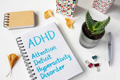 ADHD Written on a Notebook