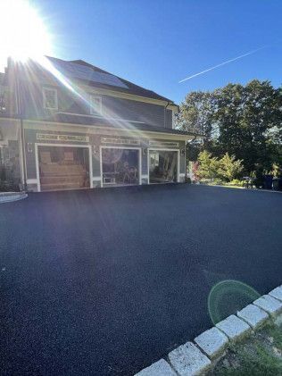 An asphalt driveway construction in Canton, MA by Norfolk Asphalt Paving & Excavation