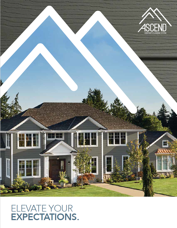 Gray house with white trim, set in a green lawn, under blue mountains logo. 