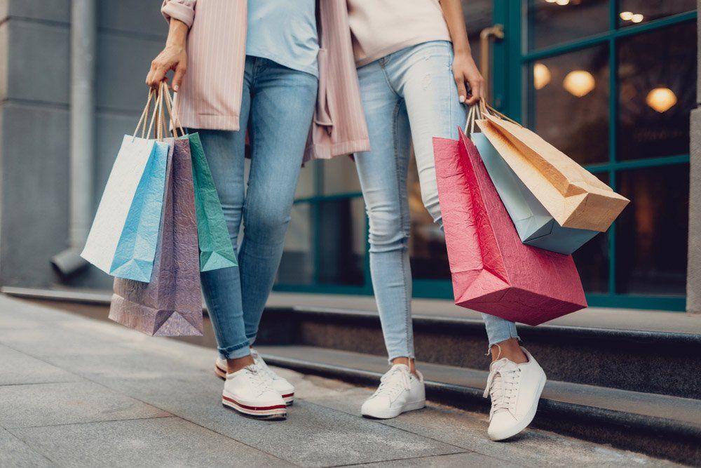 Women In White Shoes Shopping — Quality Shoe Shop in Maroochydore, QLD