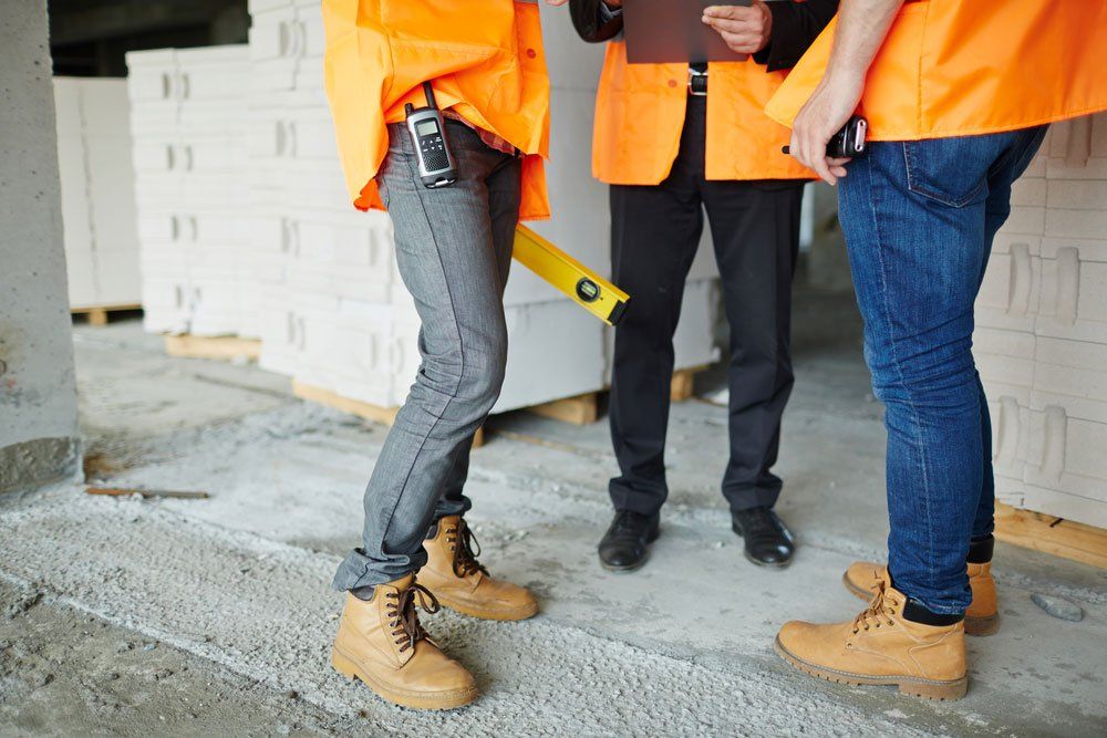 Construction Workers In Brown Boots — Quality Shoe Shop in Maroochydore, QLD