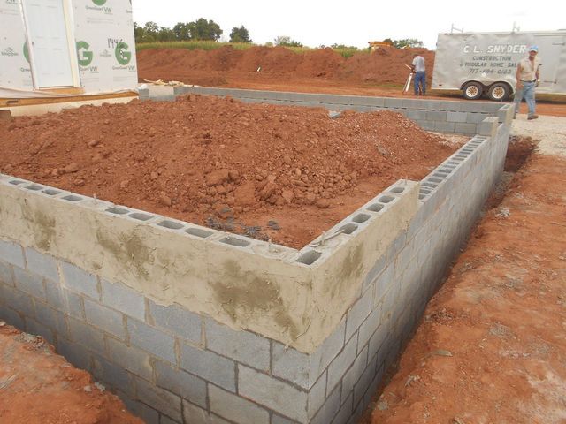 A Large Pile of Dirt and Bricks on A Construction Site