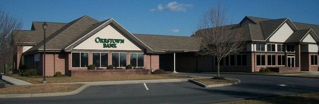 A Large Brick Building with A Sign that Says Oakview Bank