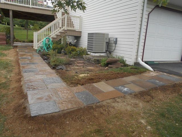 A Walkway Is Being Built in Front of A White House.