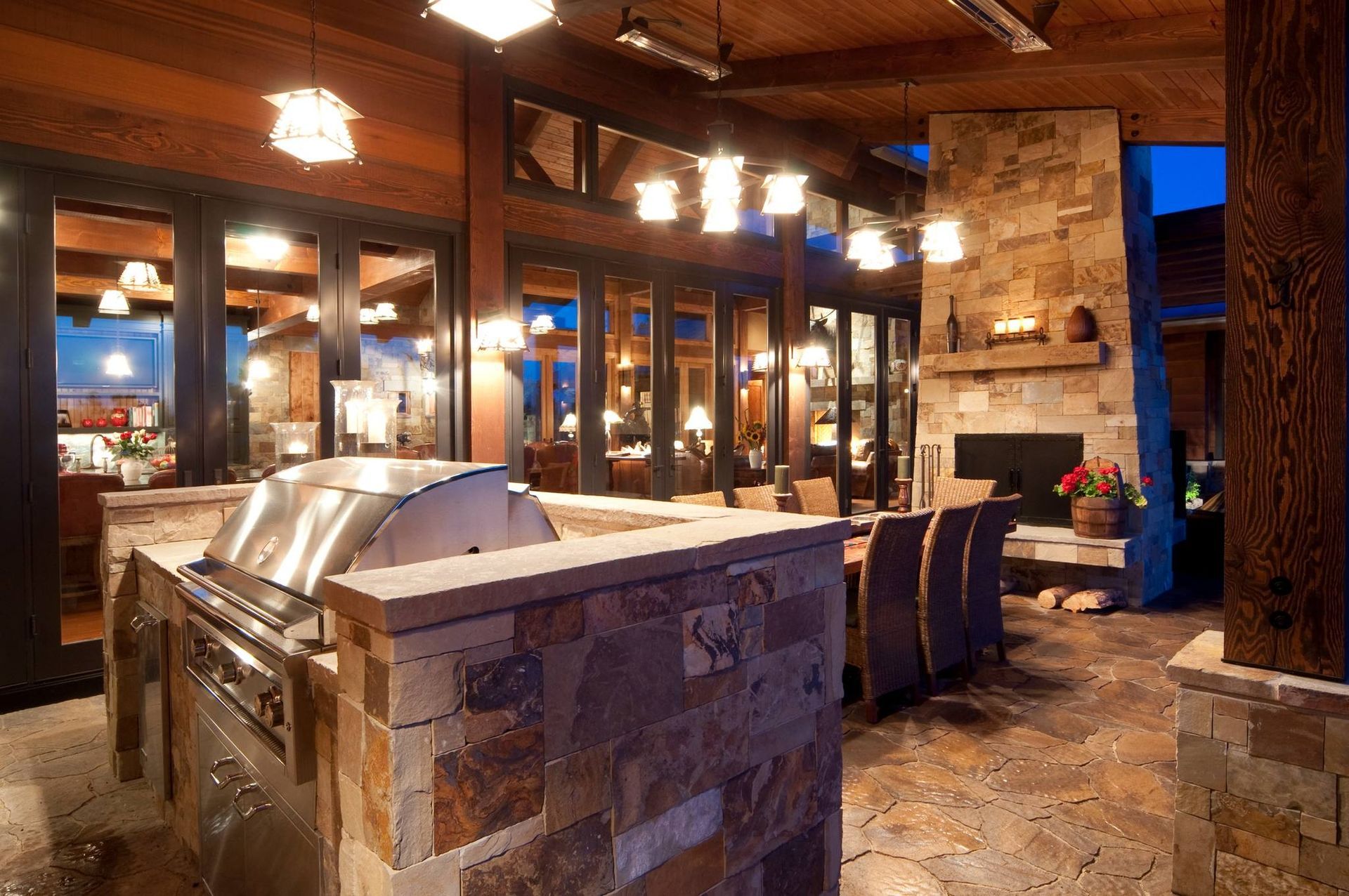 A Patio Area with A Grill and A Fireplace