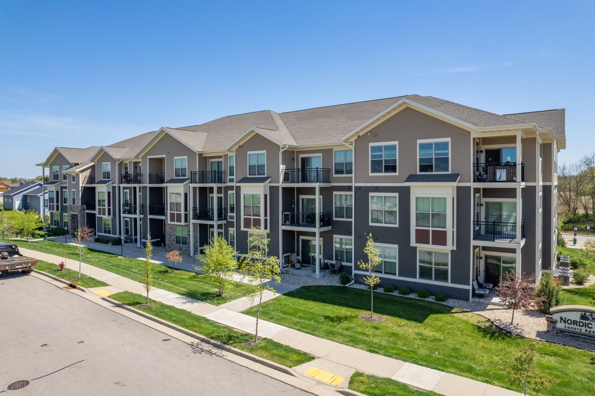 a large apartment building with a lot of windows