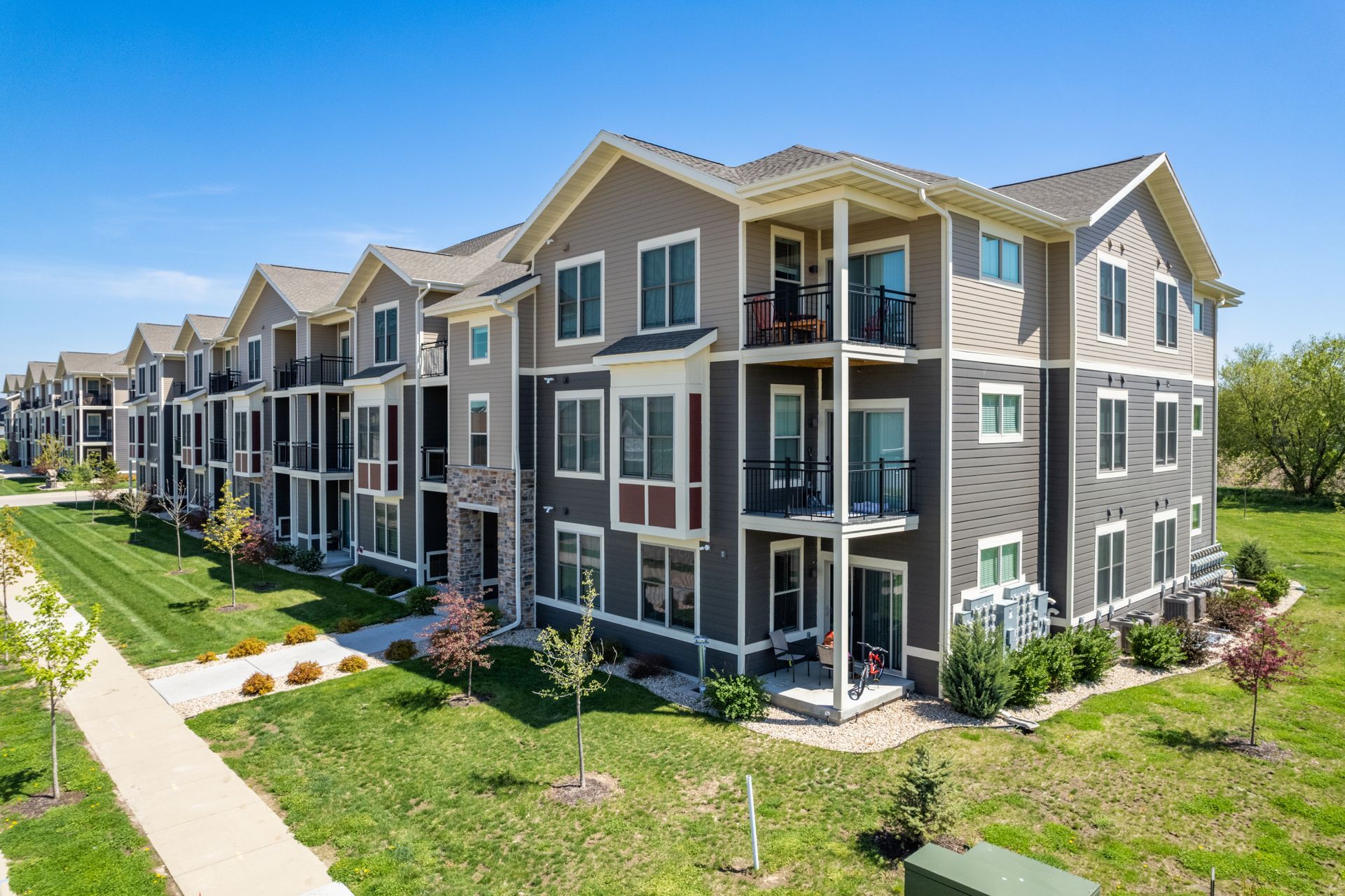 a large apartment building with a lot of windows
