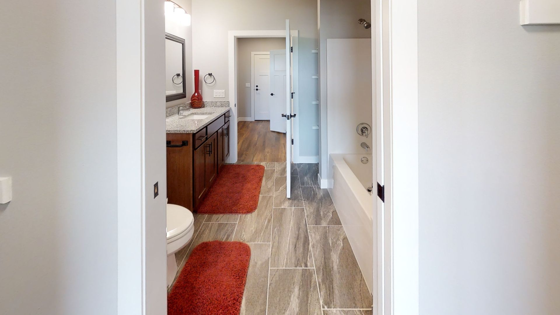 a bathroom with a toilet a sink and a bathtub