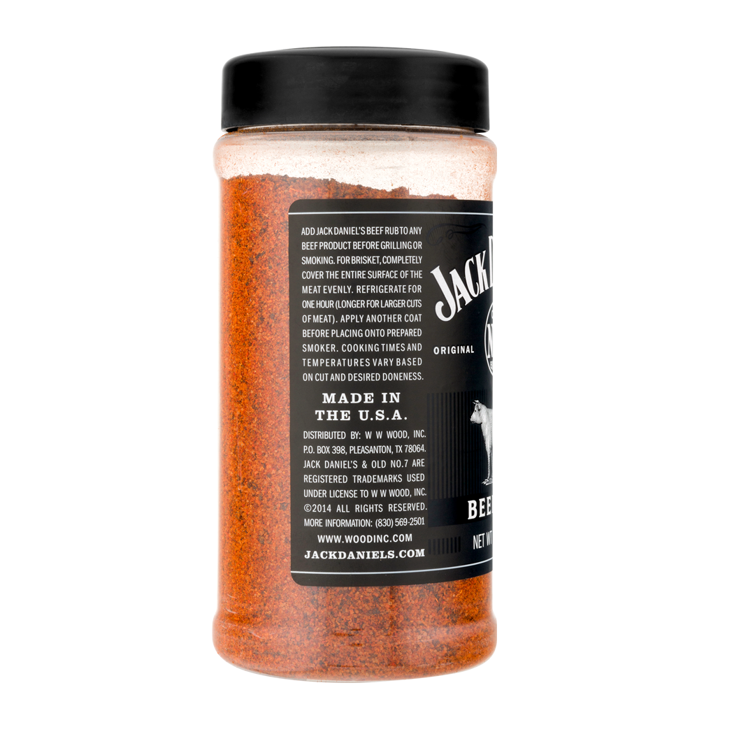 Jack Daniel's dry rub seasoning bottle, orange-brown color, with black label and lid. 