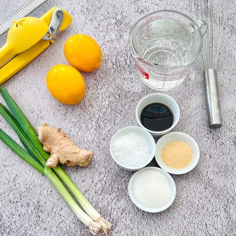 Lemon brine ingredients, lemons, ginger, scallions, salt, sugar, fish sauce, water, garlic