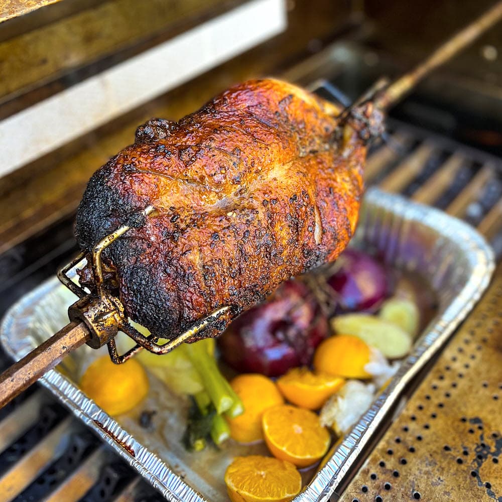 Rotisserie Maple Smoked Duck on the grill