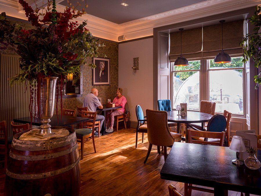 A selection of drinks drinks on shelves inside The Fox and Willow