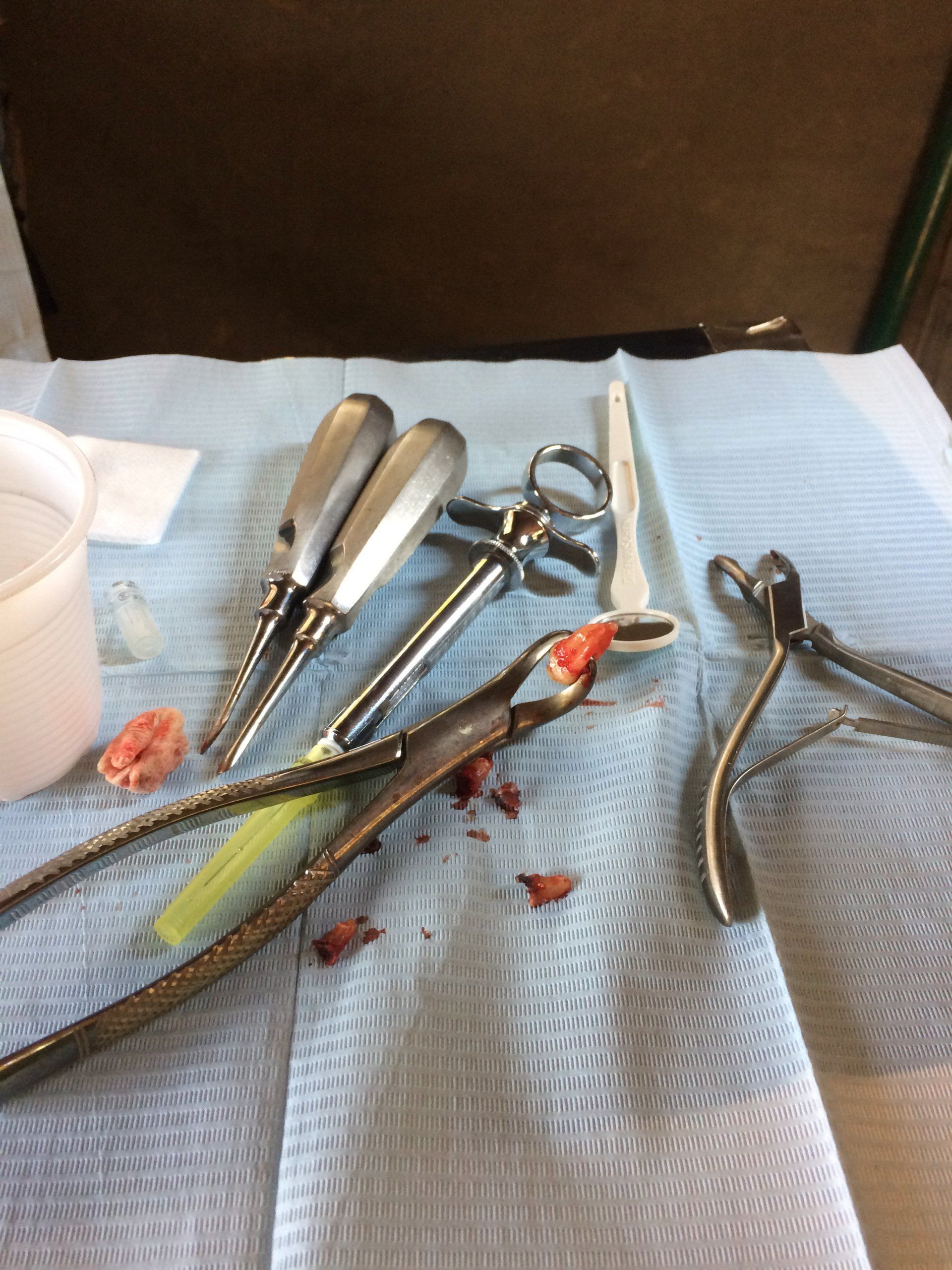 A bunch of dental instruments are on a table