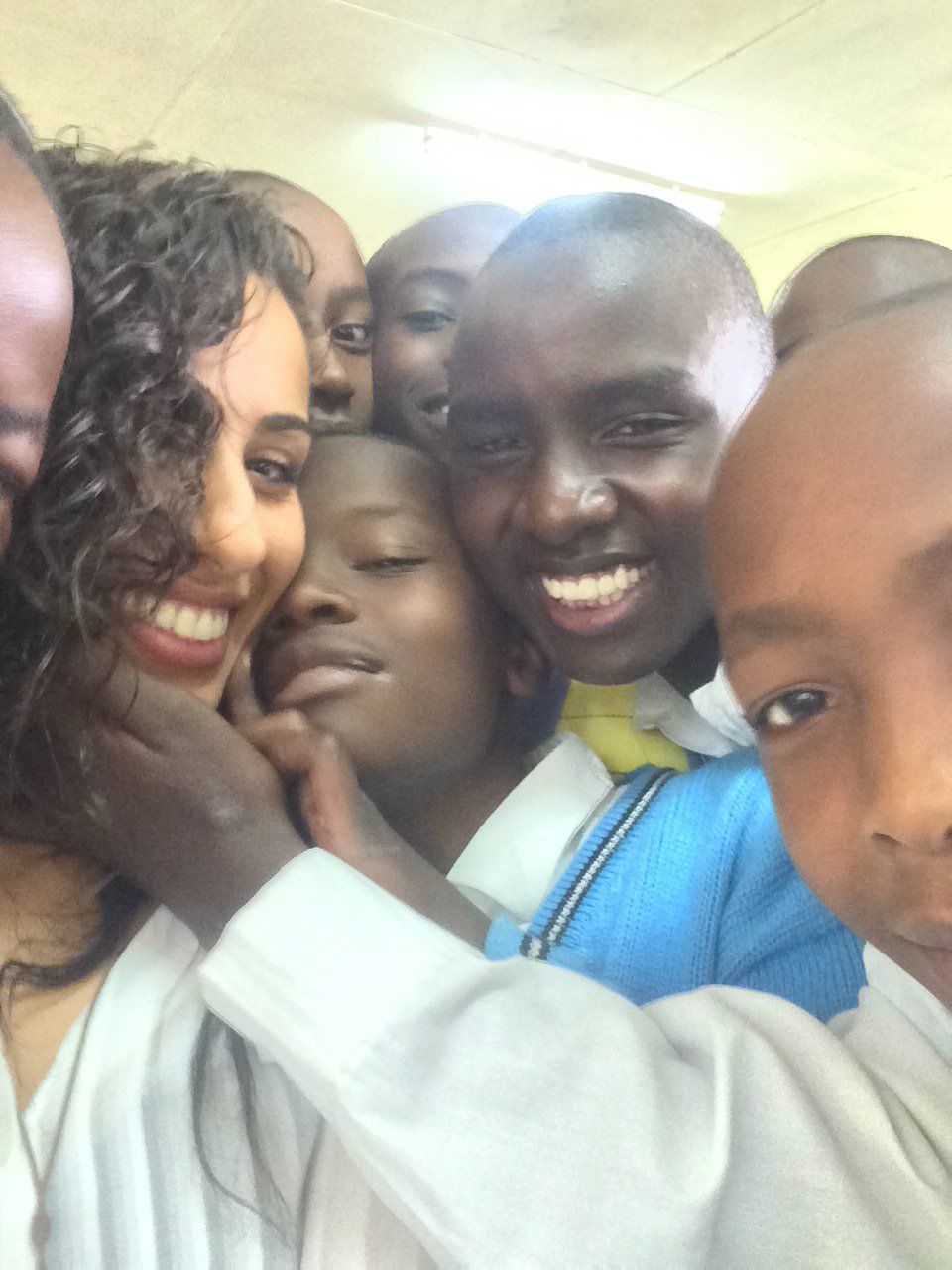 A group of people are posing for a picture together