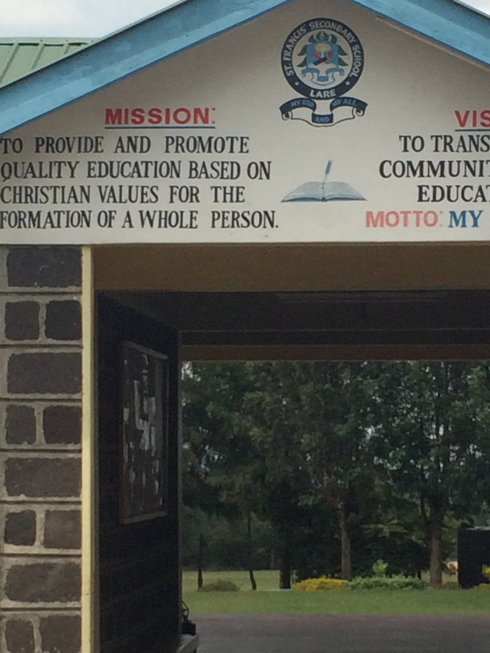 A sign that says mission to provide and promote quality education based on christian values for the formation of a whole person