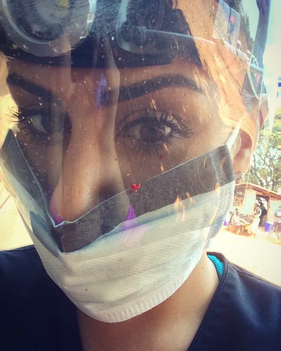 A close up of a person wearing a mask and goggles