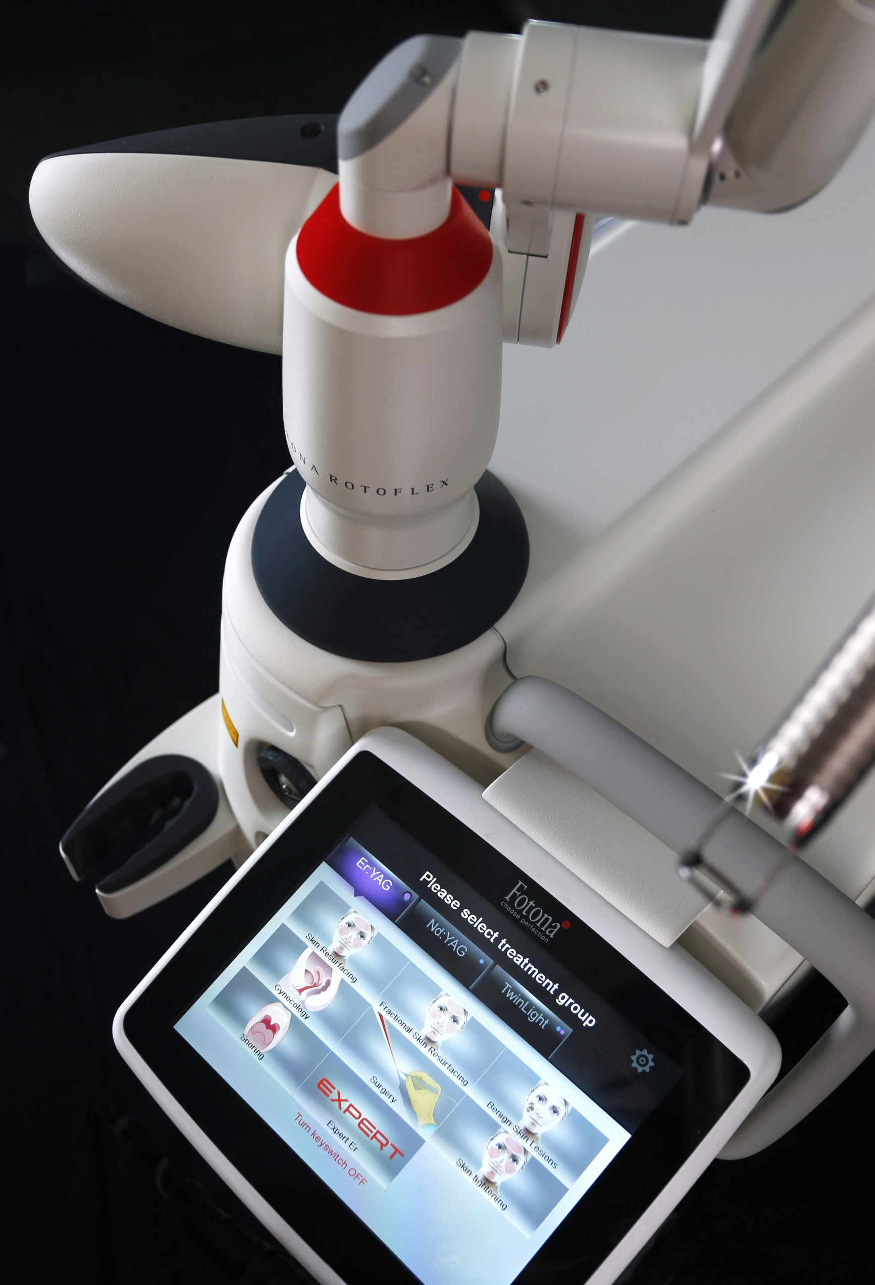 A device with a screen that says ' surgical ' on it