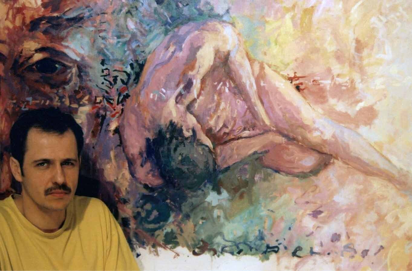 Mariusz Kaldowski with his painting Cross — studio/install view.