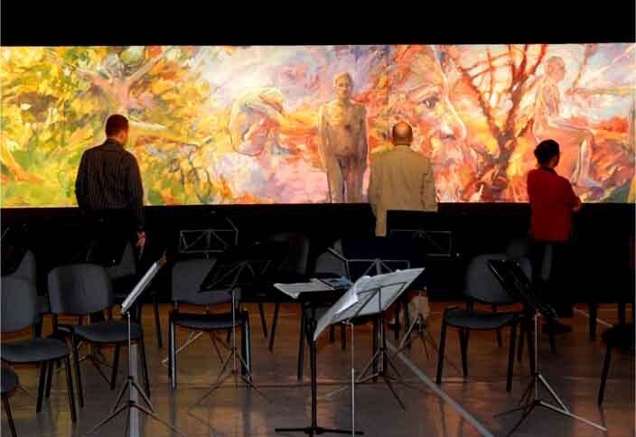 audience looking at frieze to Vivaldi's Four Seasons