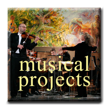Mariusz Kaldowski music projects Mariusz Kaldowski painting 'FourSeasons - Four Stages of Life' on a stage with orchestra