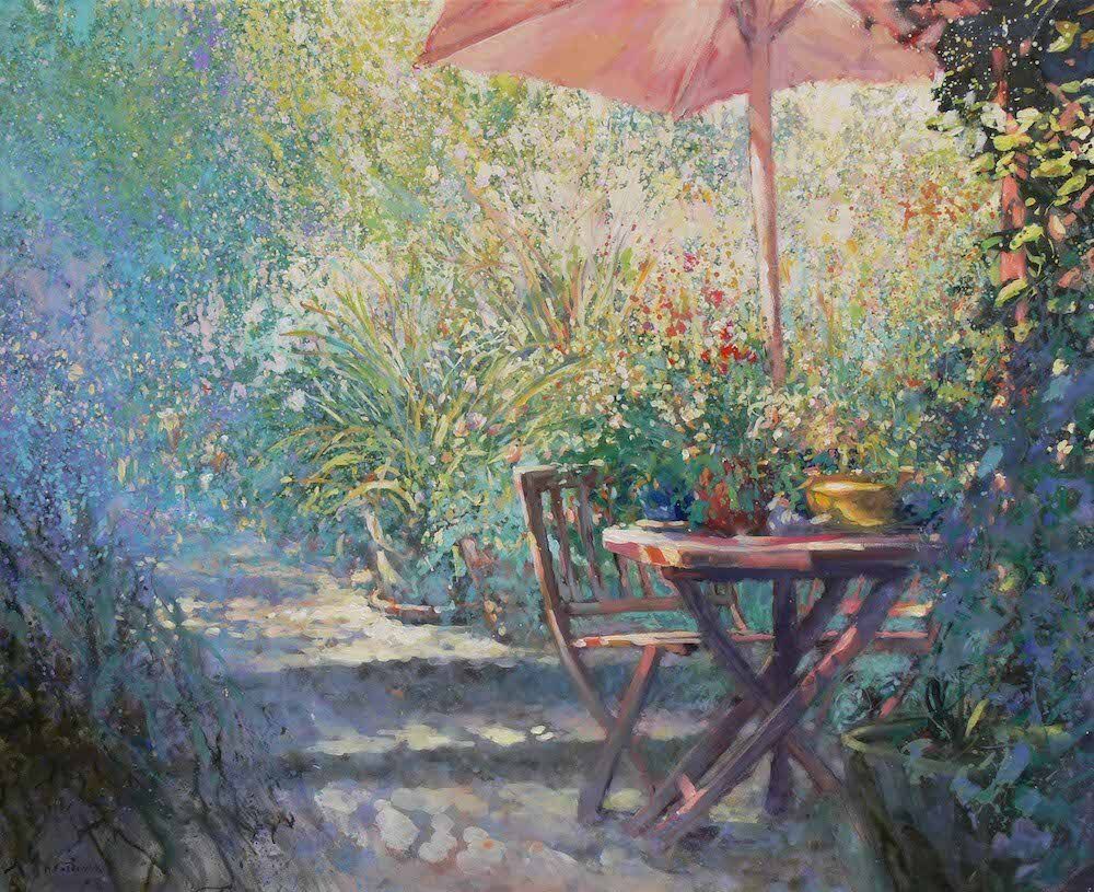 Painting of a lush garden with table, chair and parasol.