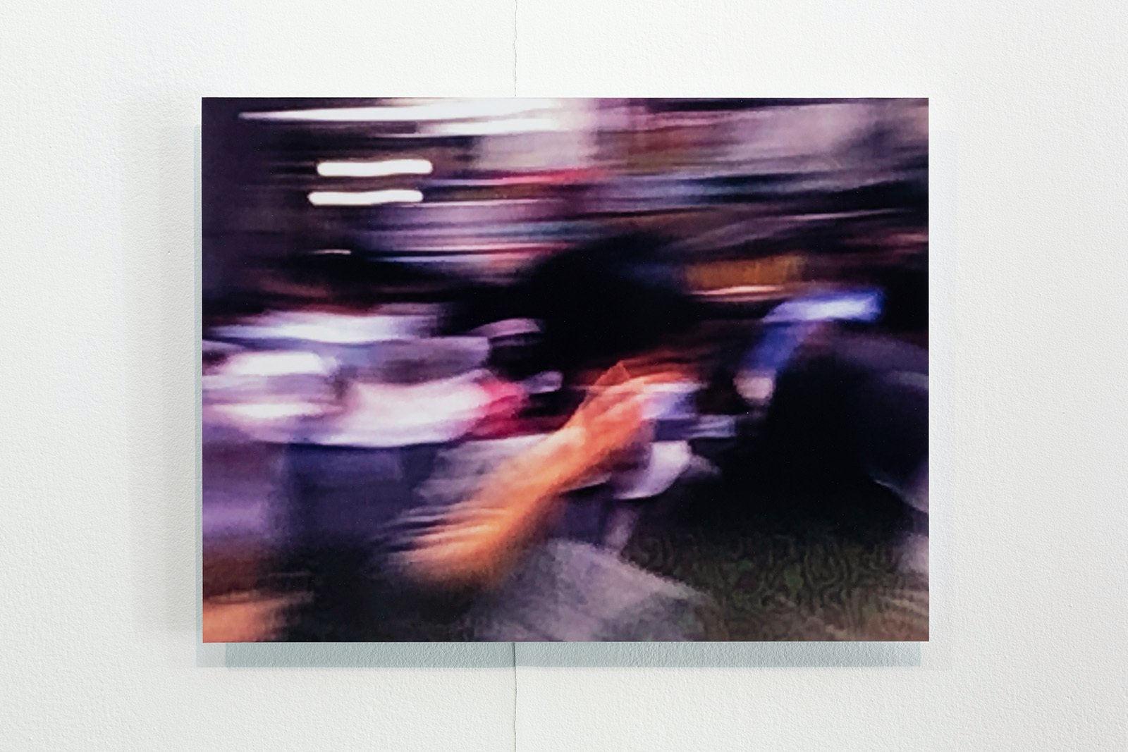  Students, Queen’s Road Central, 2003. Kodak E100VS slide film, 135mm. 2020. 37.5x50cm. Digital c-print. Installation view photographed by Jessica Maurer. 