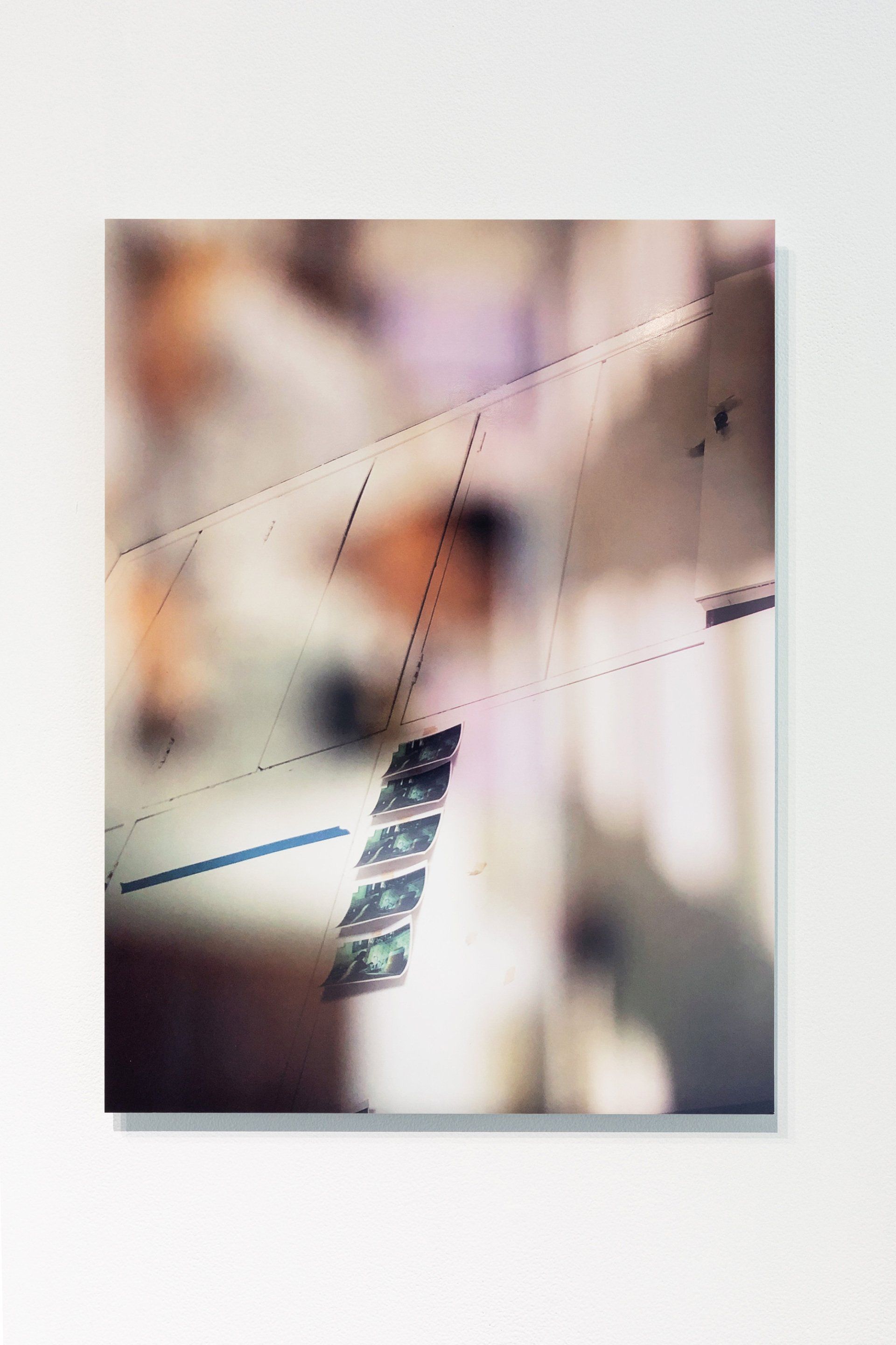  Immigration Department, Wanchai, 1999. Fujifilm RMS slide film, 135mm. 2020. 37.5x50cm. Digital c-print.  Installation view. Photograph by Jessica Maurer. 