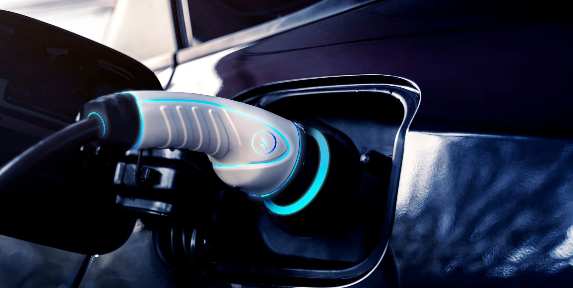 Charging Cable Plugged Into an Electric Car — SJD Electrical Contracting in Parkes, NSW