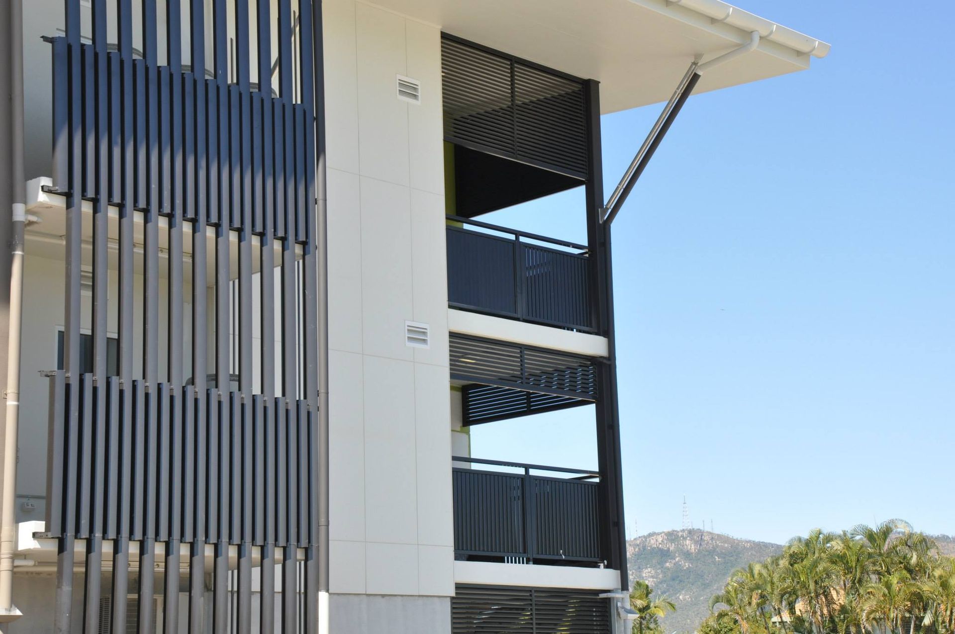 Building Exterior With Vertical Gray Sunshades