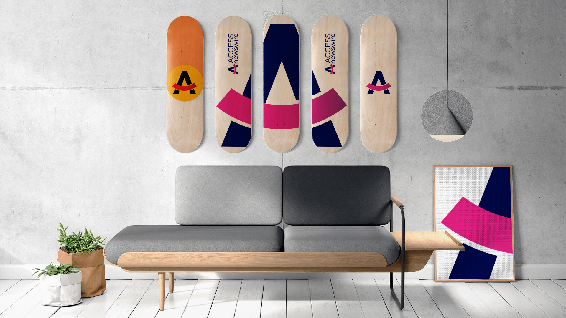 A living room with a couch and skateboards on the wall
