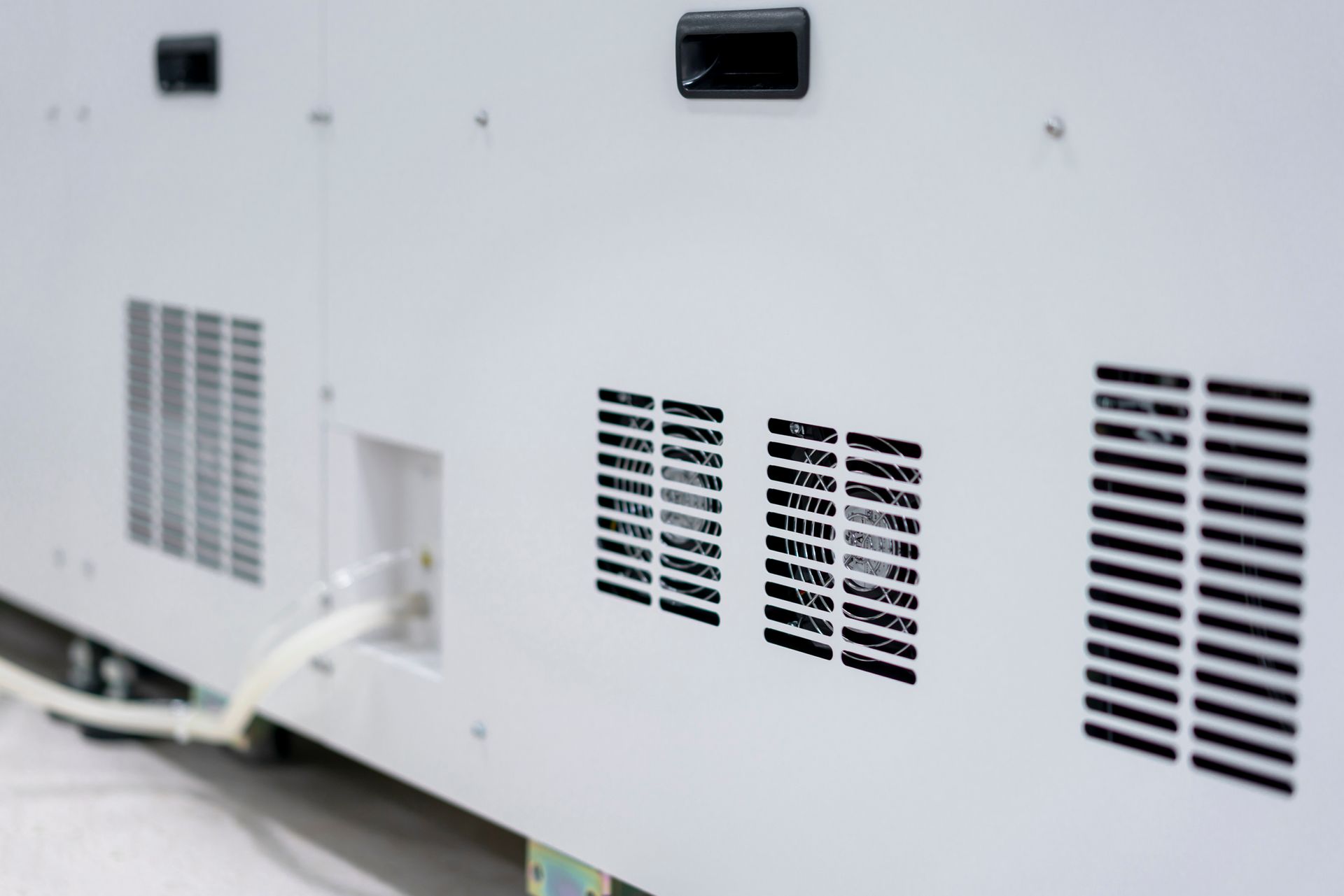 A repairman cleans and repairs the air conditioner - Tallahassee, FL - Todd King's Heating and Cooling A repairman cleans and repairs the air conditioner - Tallahassee, FL - Todd King's Heating and Cooling