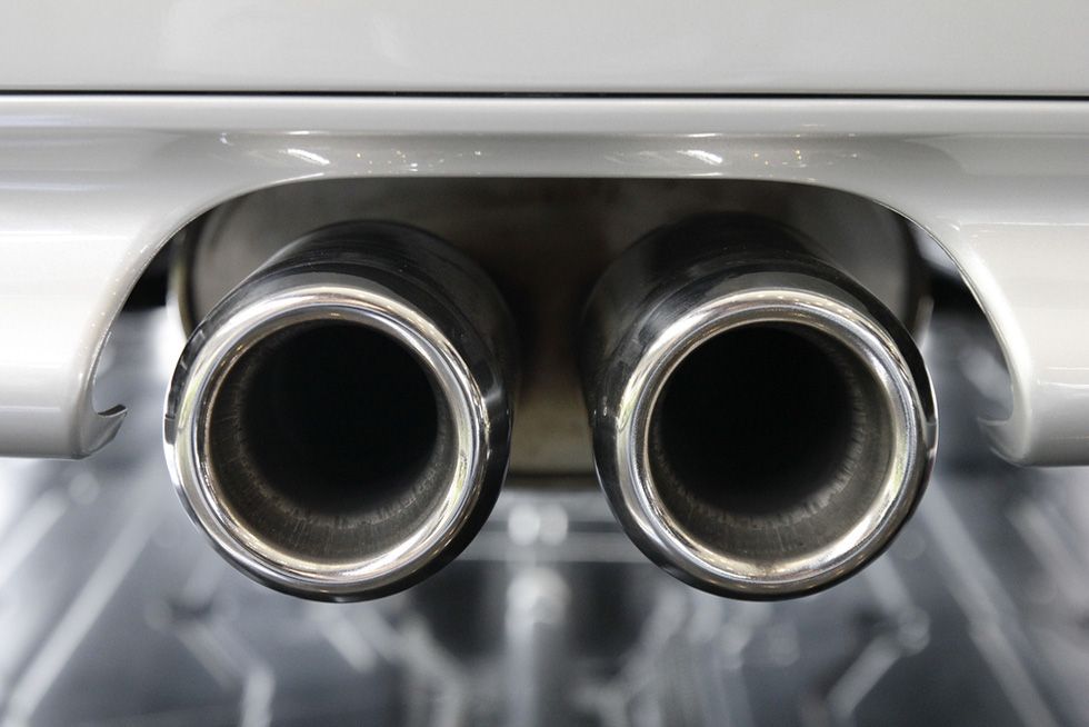 A Close Up Of Two Exhaust Pipes On The Back Of A Car — APPS Mechanical Port Macquarie In Port Macquarie, NSW