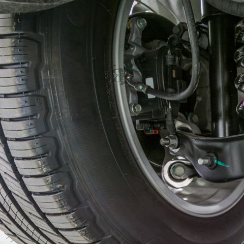 A Close Up Of A Car Tire And Suspension System — APPS Mechanical Port Macquarie In Port Macquarie, NSW