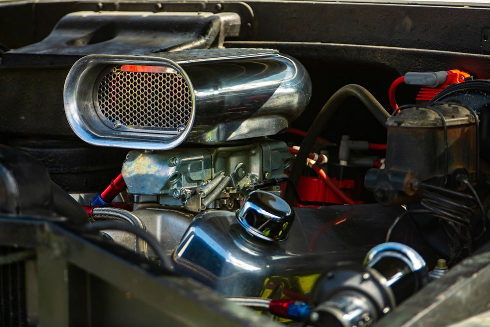 A Close Up Of A Car Engine With A Carburetor — APPS Mechanical Port Macquarie In Port Macquarie, NSW