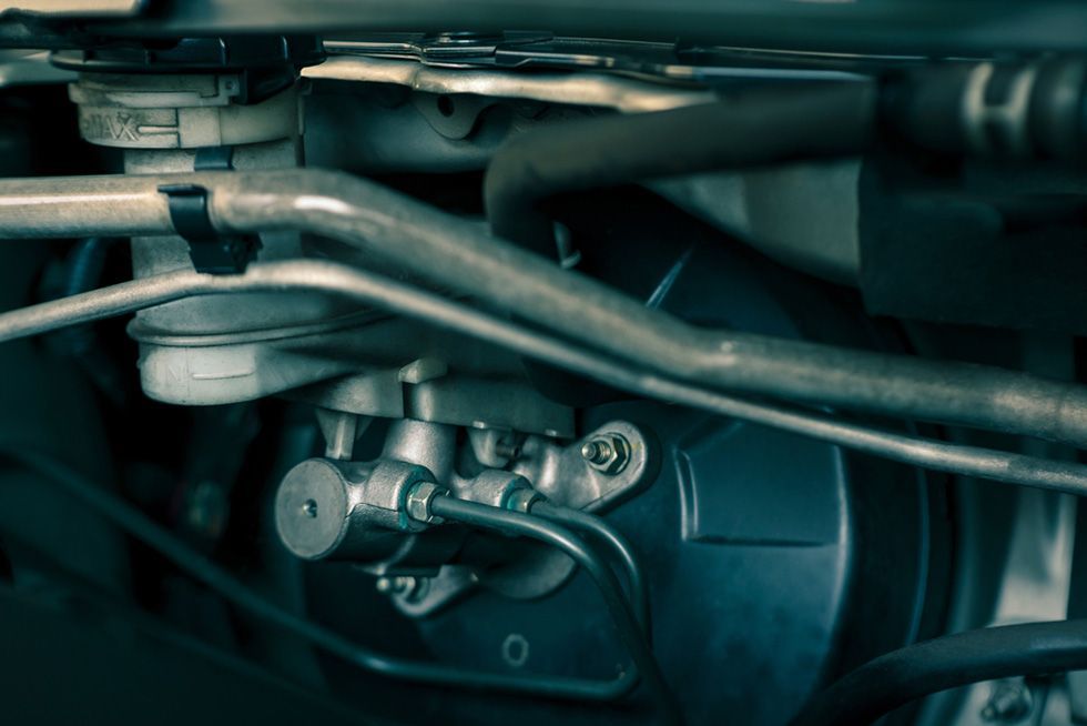 A Close Up Of A Brake System In A Car — APPS Mechanical Port Macquarie In Port Macquarie, NSW