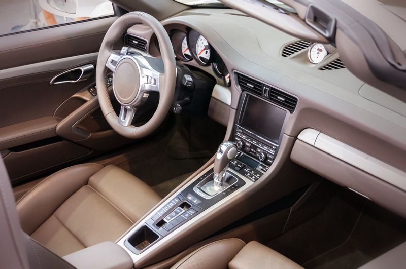 The Interior Of A Car With Brown Leather Seats And A Steering Wheel — APPS Mechanical Port Macquarie In Port Macquarie, NSW