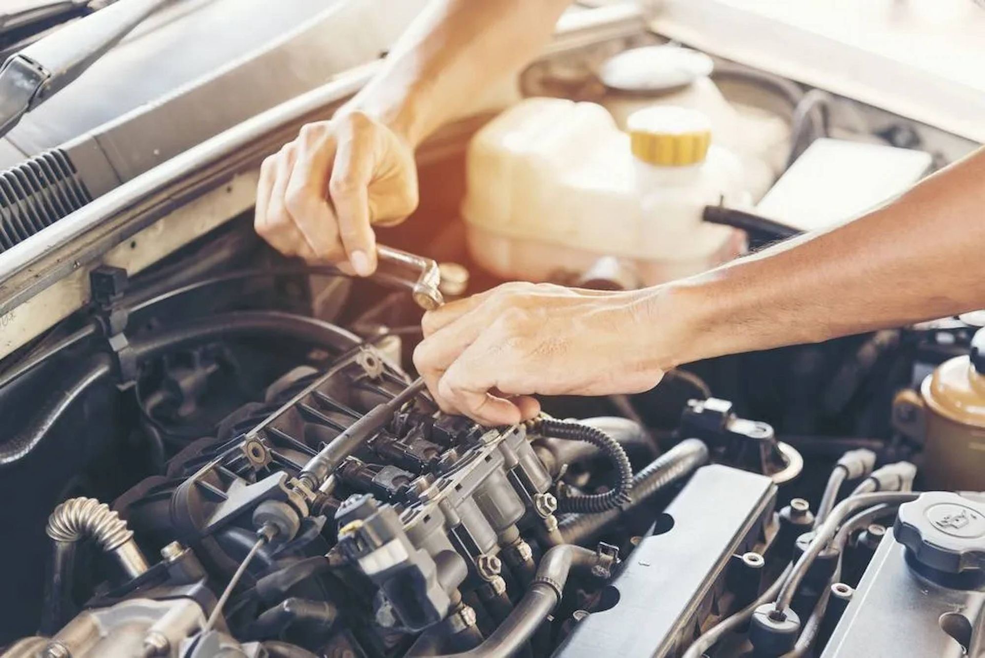 Mechanic In Port Macquarie Repairing A Vehicle Engine