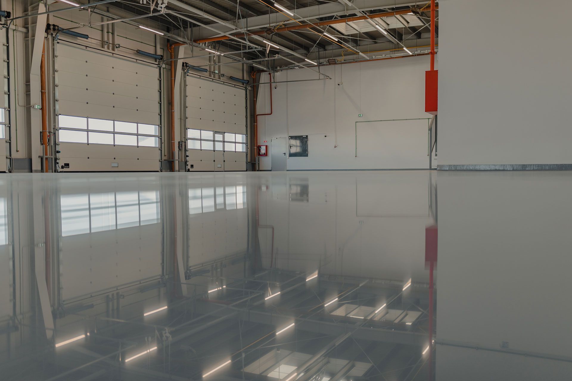 industrial garage with grey epoxy flooring