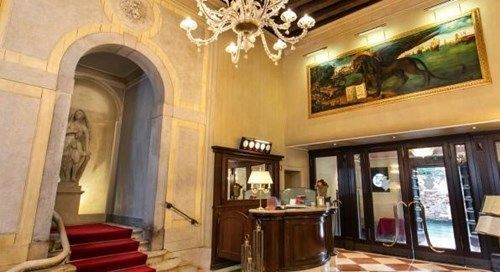 An interior view looking out through the historic entrances of Ca' Vendramin Calergi and Santa Fosca