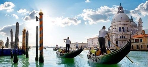 Gondolas on the Grand Canal with Santa Maria della Salute in the background.