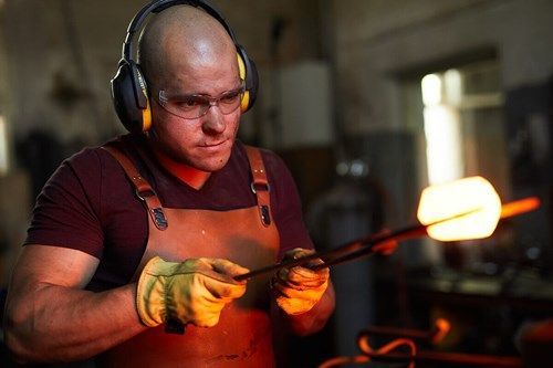 Artisan glassblower at work in Venice