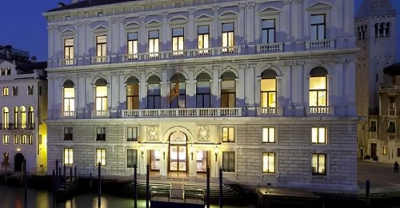 Venetian palace on the Grand Canal at night.
