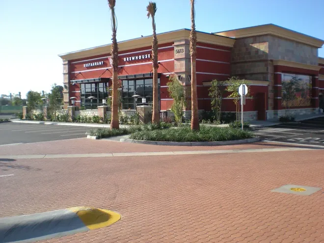 Claddagh Paving Corporation - a red building with the word lounge on it