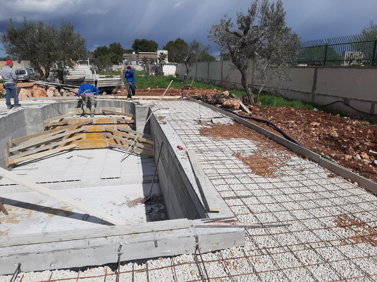 lavori realizzazione piscina