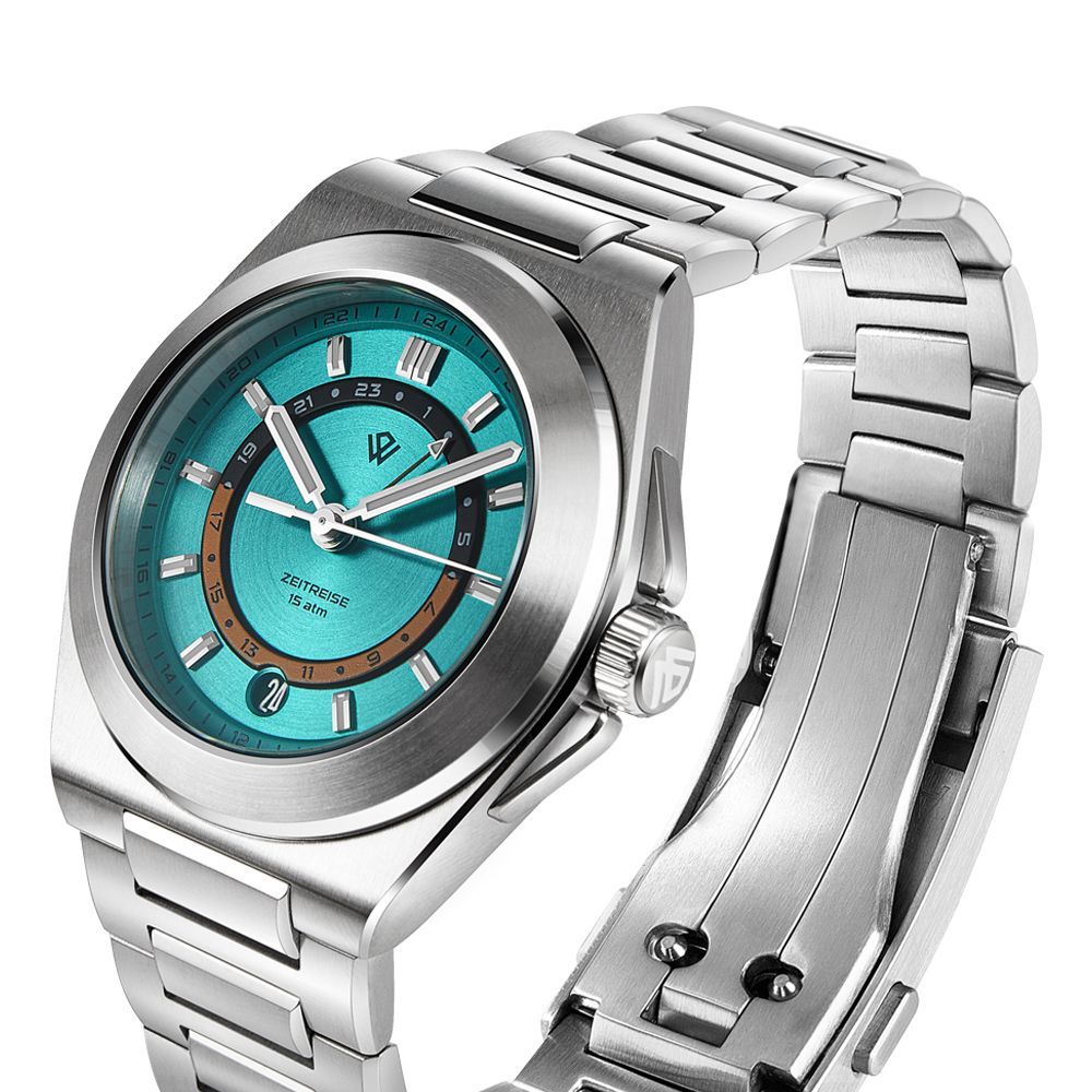 A stainless steel watch with a turquoise dial, silver indices, and a metal bracelet, angled on a white background.