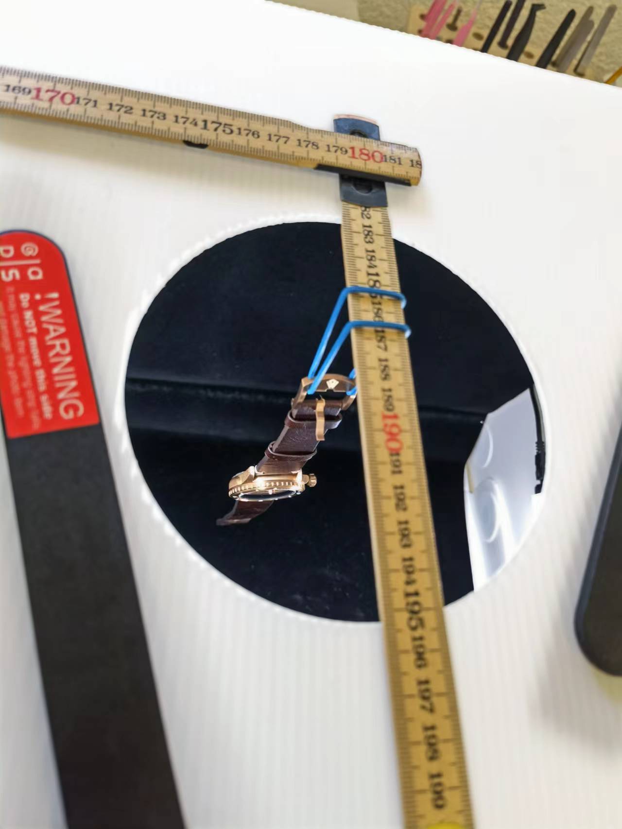 A ruler with the word warning on it