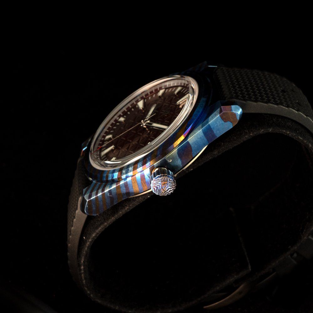 A close up of a watch on a black background